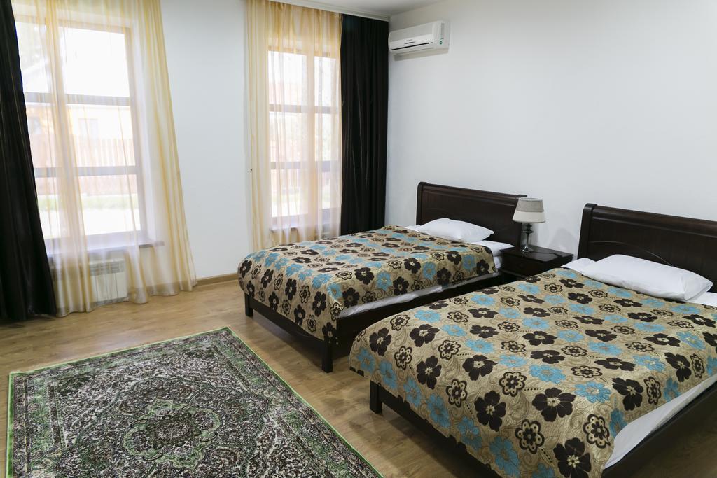Green Land Hotel Aktöbe Szoba fotó